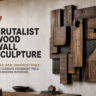 A horizontal banner showcasing a textured Brutalist wood wall sculpture made of heavy, interlocking dark blocks and charred timber mounted on a concrete wall. To the left, large text reads: "7 Brutalist Wood Wall Sculpture. Bold, Raw, Unforgettable – The Ultimate Statement Piece for Modern Interiors." Below the artwork sits a modern wooden credenza displaying a black bowl and books. Part of a neutral armchair and a large window with bare branches are visible on the far left.