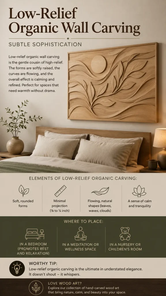 An infographic about home decor titled "Low-Relief Organic Wall Carving – Subtle Sophistication." The top photo shows a large, rectangular light wood panel with a softly raised carving of flowing waves, leaves, and a circular sun, beautifully mounted above a wooden bed frame in a serene bedroom setting. Below the main image, icon sections highlight the elements of low-relief organic carving, recommended placements (bedroom, meditation space, or nursery), and a "Worthy Tip" on understated elegance.