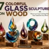 Horizontal Pinterest image displaying bold text reading "7 COLORFUL GLASS SCULPTURES ON WOOD" alongside the subtitle "Vibrant and Eye-Catching Pieces That Transform Any Room." Below, seven hand-blown glass decor pieces—featuring flame, teardrop, crescent, circular, and spherical shapes—are mounted on natural wood bases across a wooden tabletop. Swirling colors of turquoise, magenta, amber, green, and deep purple shine in soft sunlight. "WOODZAA.COM" is displayed at the bottom center.