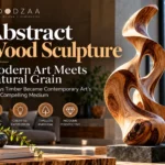 "Abstract Wood Sculpture: Modern Art Meets Natural Grain" by Woodzaa. The right side features a fluid, twisting carved wooden sculpture with rich natural grain patterns set on a dark square pedestal. On the left, bold overlay text reads "7 Ways Timber Became Contemporary Art's Most Compelling Medium," accompanied by four circular icons highlight themes like Natural Beauty, Creative Expression, Timeless Material, and Modern Perspective.